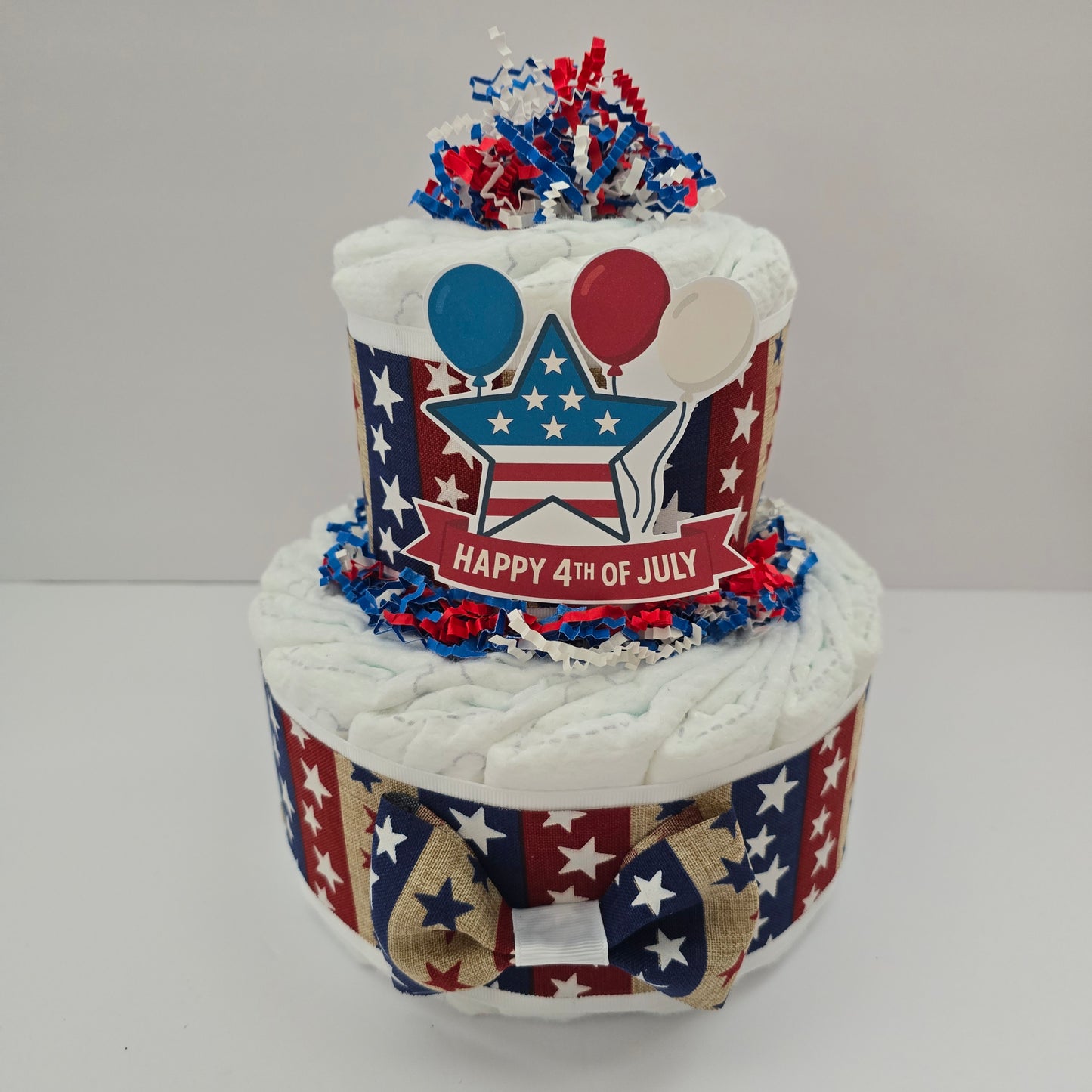Celebrate baby’s first Independence Day with this handcrafted 4th of July diaper cake! Perfect for patriotic showers, July due dates, or gifting something truly special.